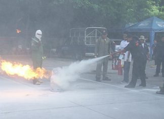 Employees of Grand Sole Hotel Pattaya Beach learn how to use a fire extinguisher.